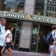 Pedesterians in front of Panera Bread